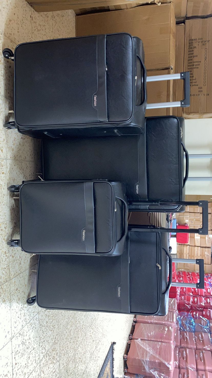 شنط سفر جلد 4قطع